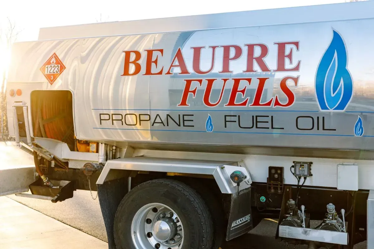 Beaupre Fuels propane and fuel oil tanker truck in bright sunlight