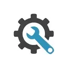 A wrench is sitting inside of a gear.