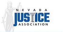 The logo for the nevada justice association with a statue of justice in the background.
