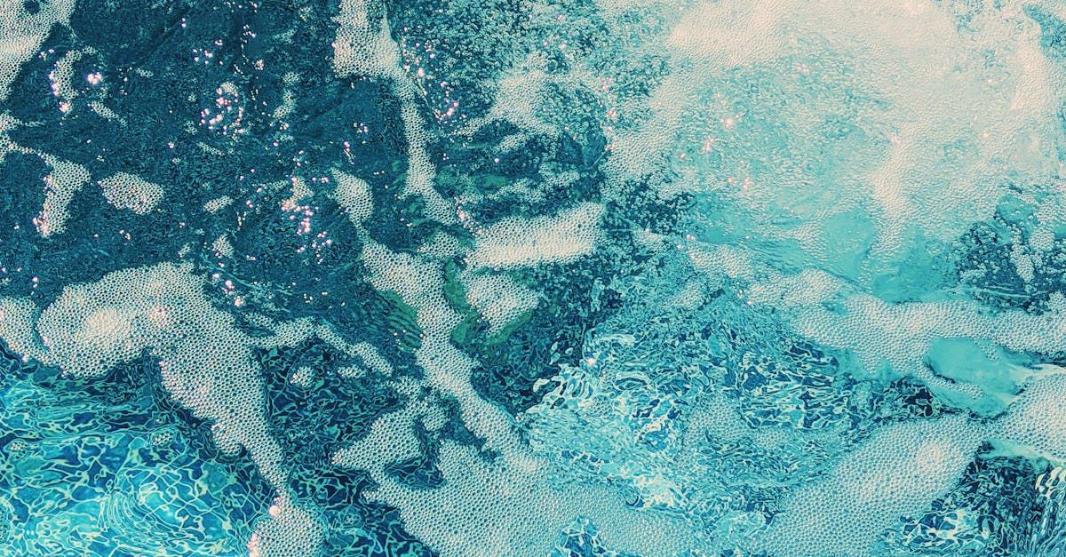 A close up of a blue and white marble texture.