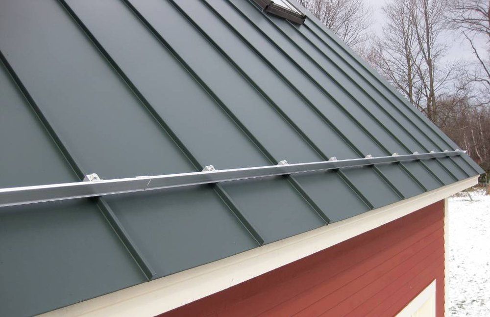 Snow Guards Cover | Milton, VT | Bronson Johnson Seamless Gutters Snow Guards Cover | Milton, VT | Bronson Johnson Seamless Gutters