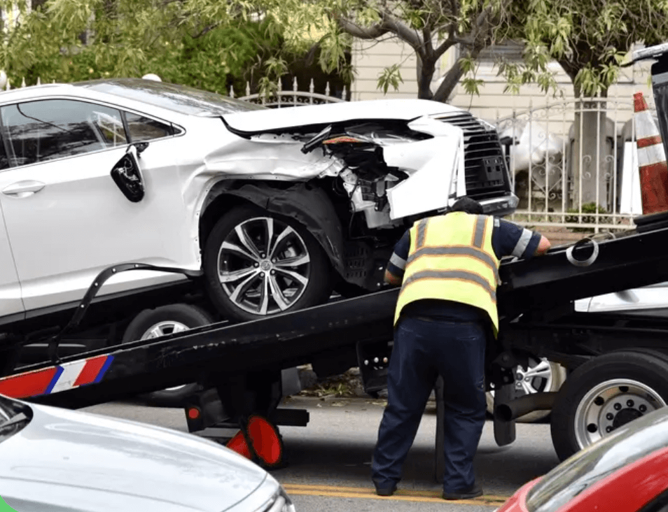 Towing company servicing a crashed car in Plano, TX