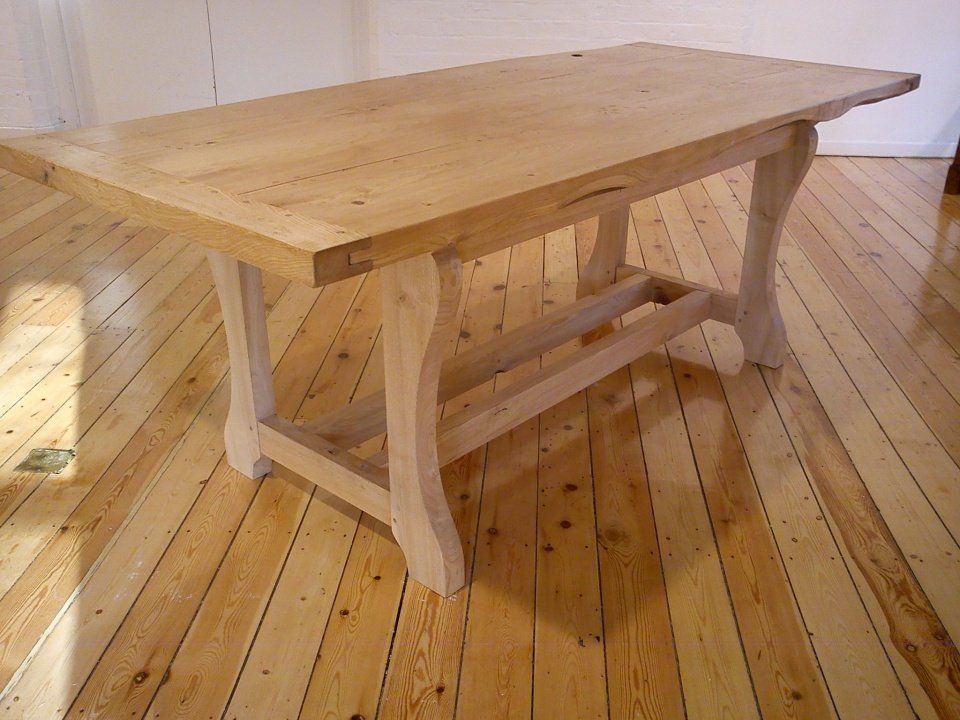 image of a large plank top dining table in sweet chestnut made by Patrick Turk the owner of Forest 2 Furniture using timber milled and dried by him