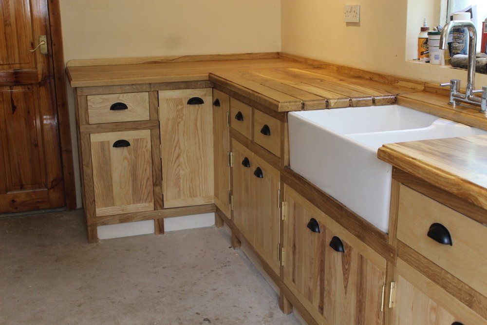 image showing more of the kitchen cabinets.
The client drove 4hrs each way to buy timber from us having seen our website, he had been impressed with how we process and store our timber.
We know exactly where the timber came from and where the trees grew.
