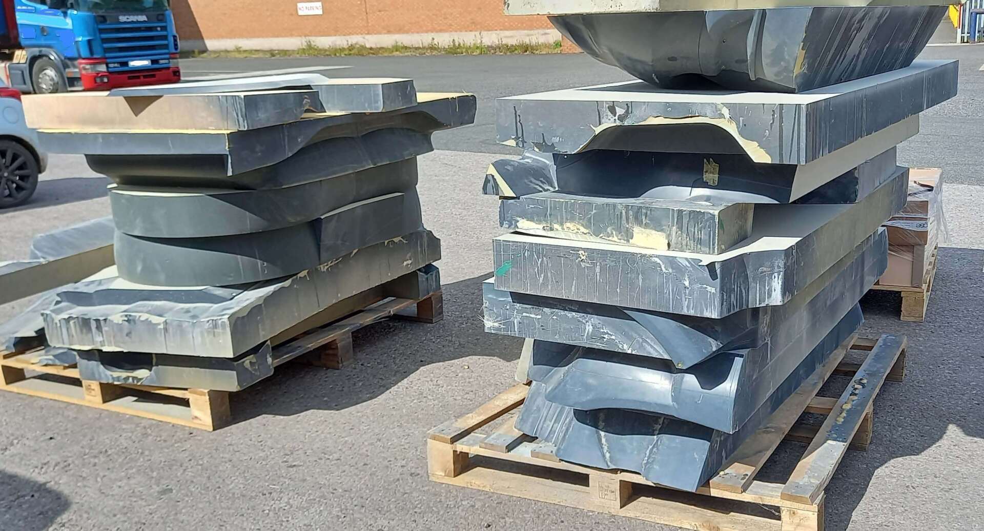 Car body panel moulds sawn into slabs at customer's factory site for re-use 
