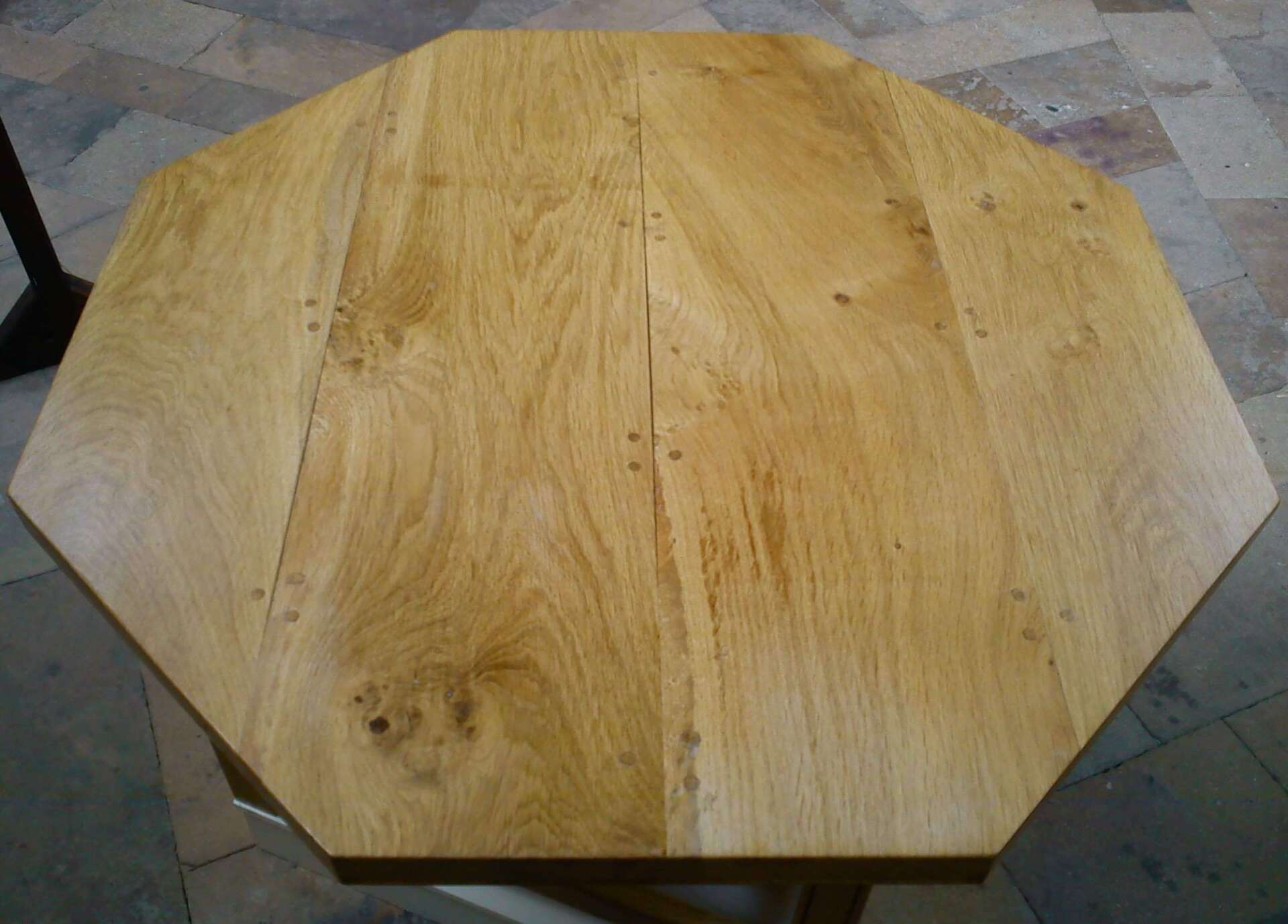 The table is made in solid Oak, timber was milled from a tree grown in Sherwood Forest.
The top is made from 4 planks that are jointed using tenons and pegged through the surface.
For the base the rails are mortice into the legs and secured in the traditional method with pegs.