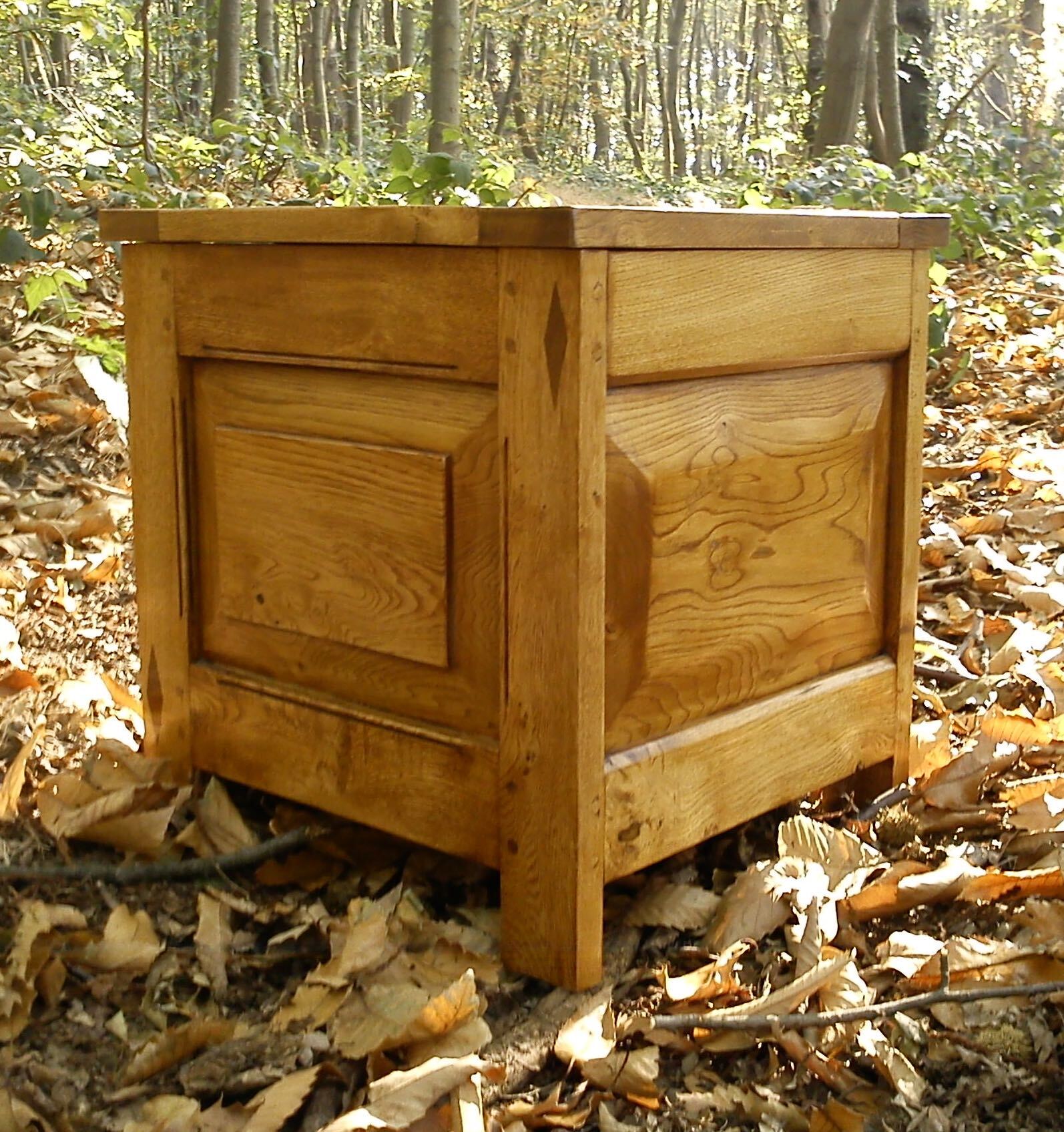image of a Side chest in stained Sweet Chestnut with Laburnum inlay made by Patrick Turk the owner of Forest 2 Furniture using timber milled and dried by him