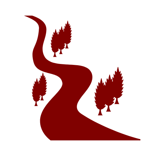 A red road with trees on the side of it