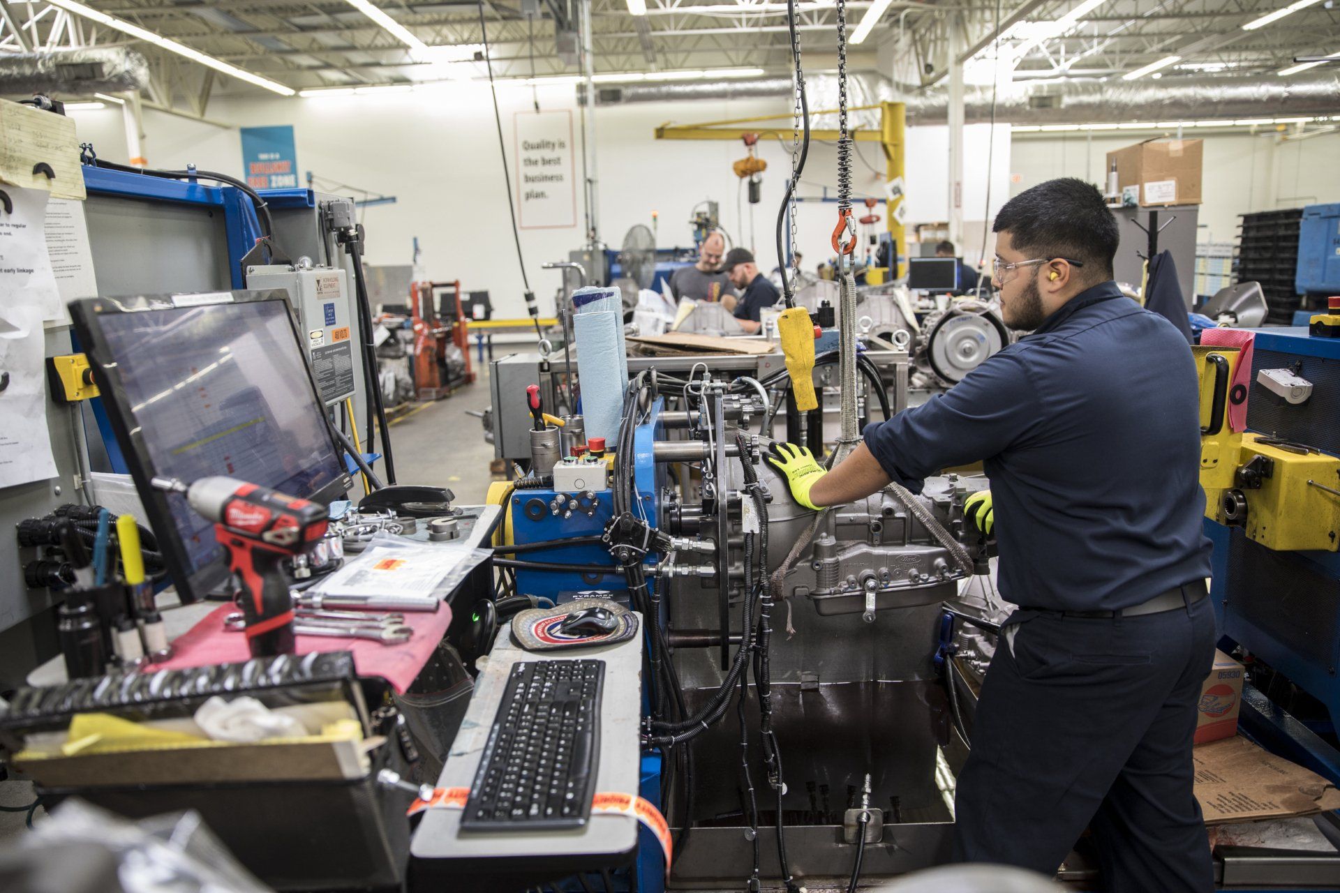 Mechanic Lying And Working Under Car - Waldorf, MD - Transmission Warehouse