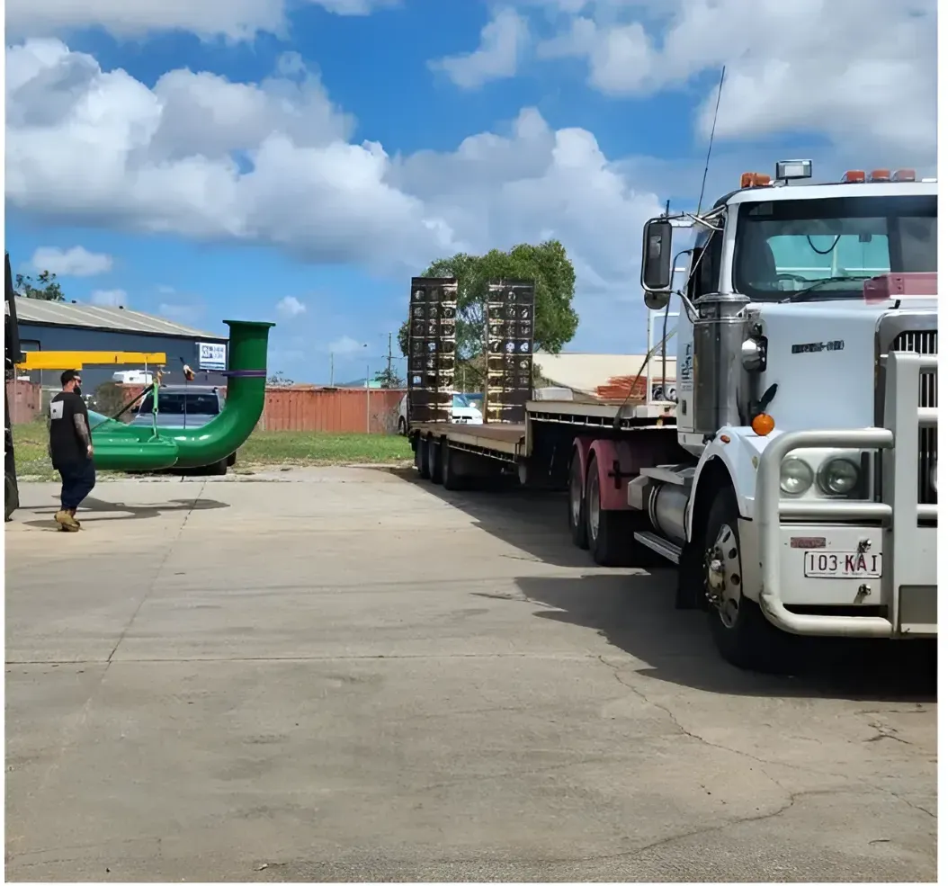 A White Semi Truck With A License Plate — ADK Coatings In Toolooa, QLD