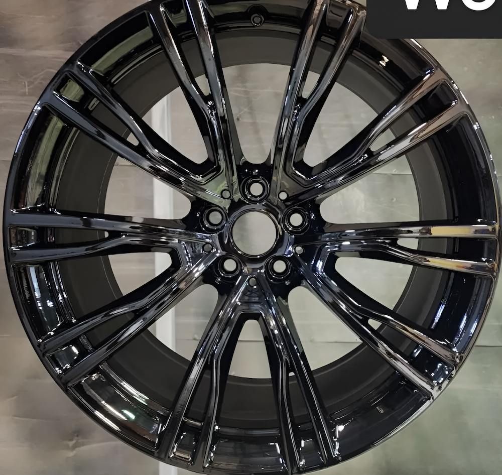A Close Up Of A Black Car Wheel With A Shiny Finish — ADK Coatings In Rockhampton, QLD