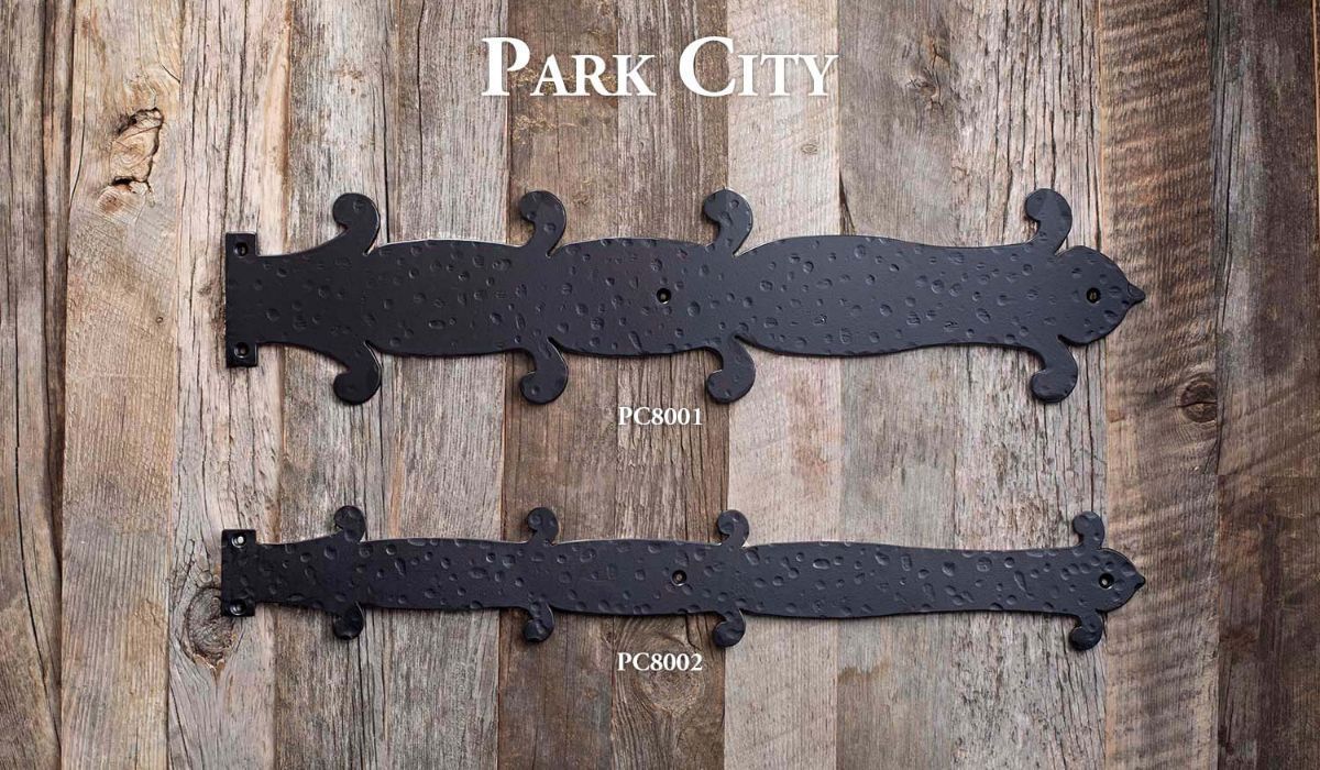 Park City sign on weathered wood with two black metal brackets and labels for floors and widths