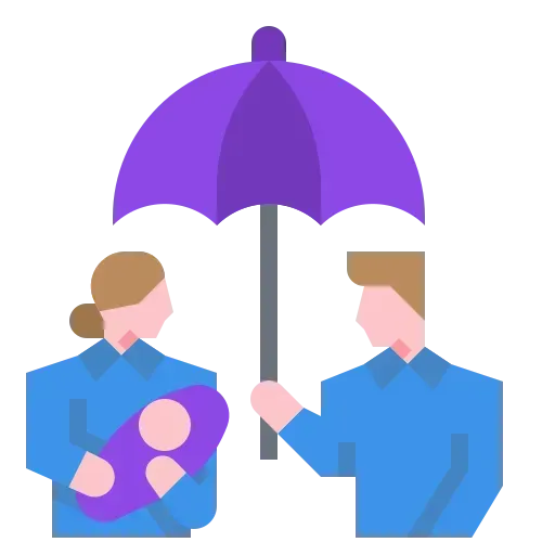 A man and a woman are holding a baby under an umbrella.