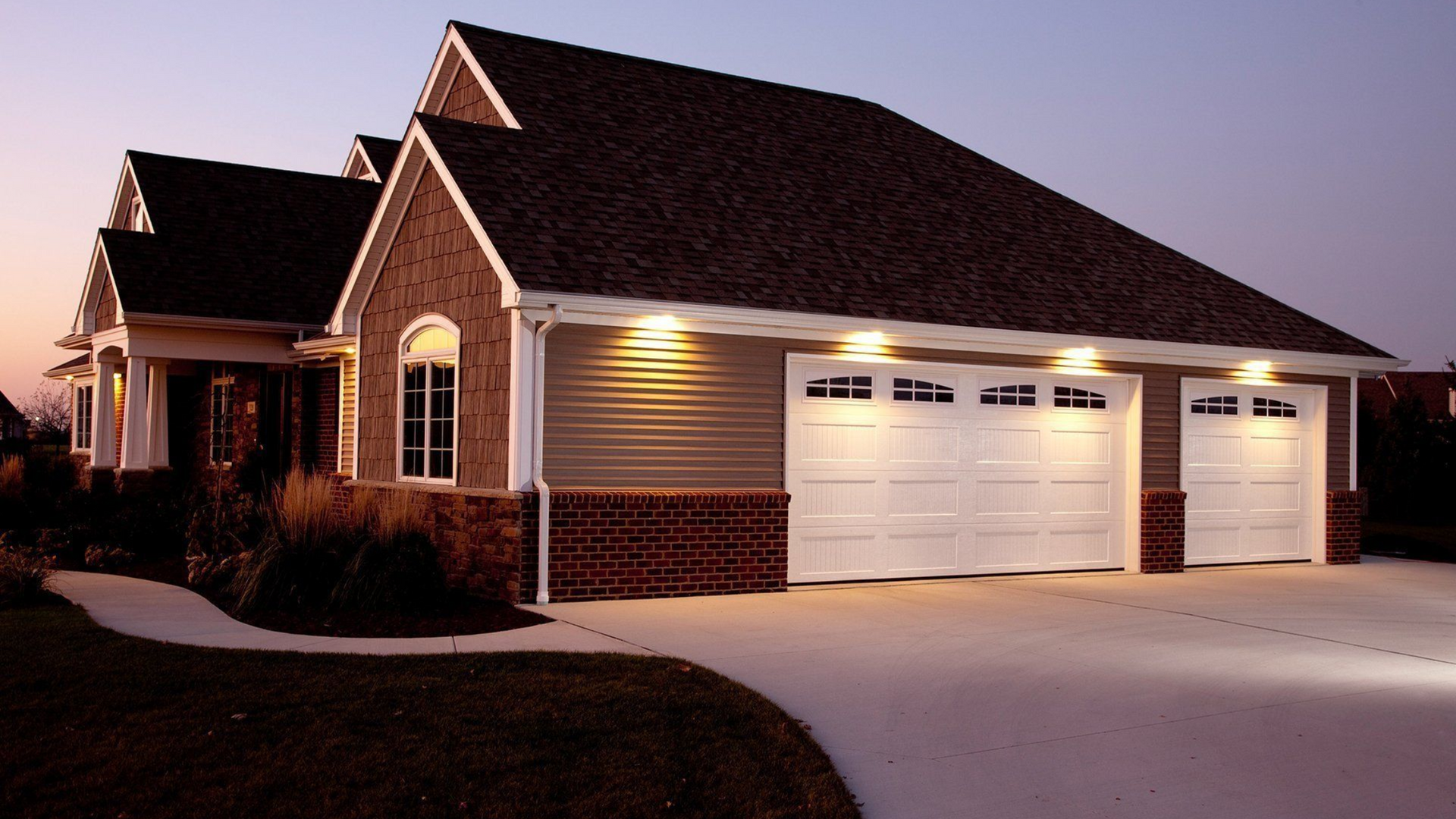 House with two white garage doors