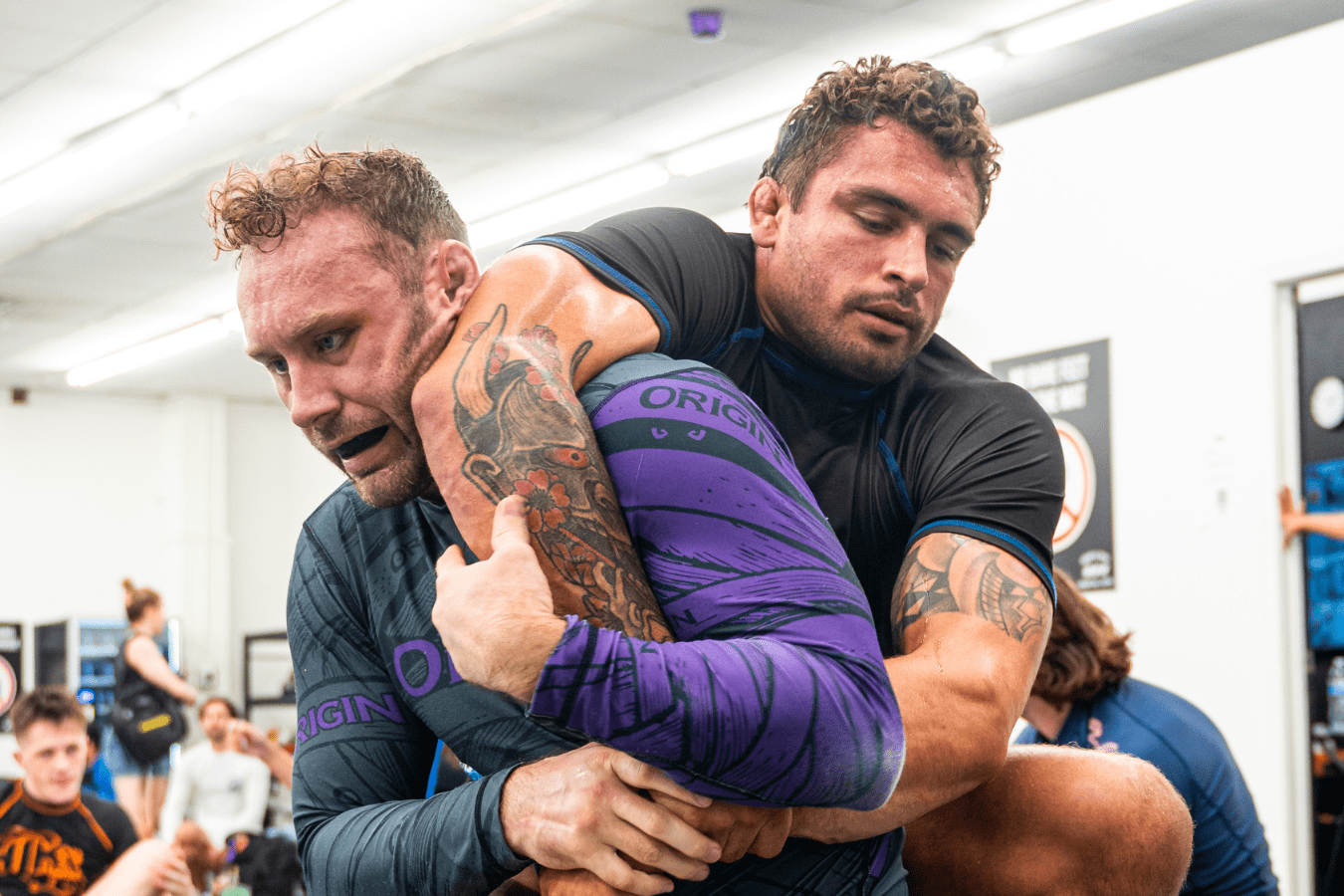 Students learning practical self-defense and martial arts techniques in a safe and encouraging environment.