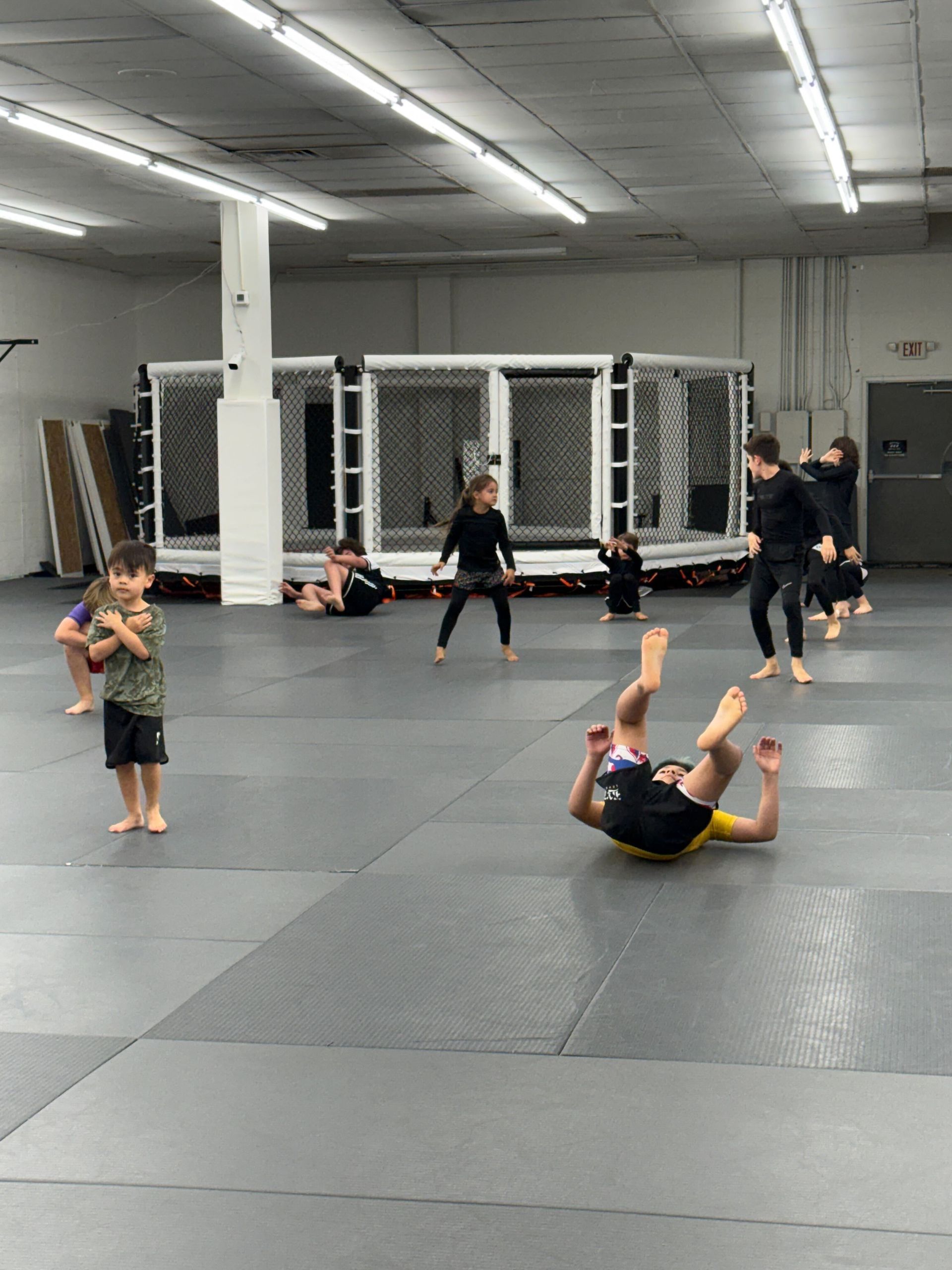 Kids Martial Arts training at Simple Man Martial Arts encouraging teamwork, discipline, and perseverance.