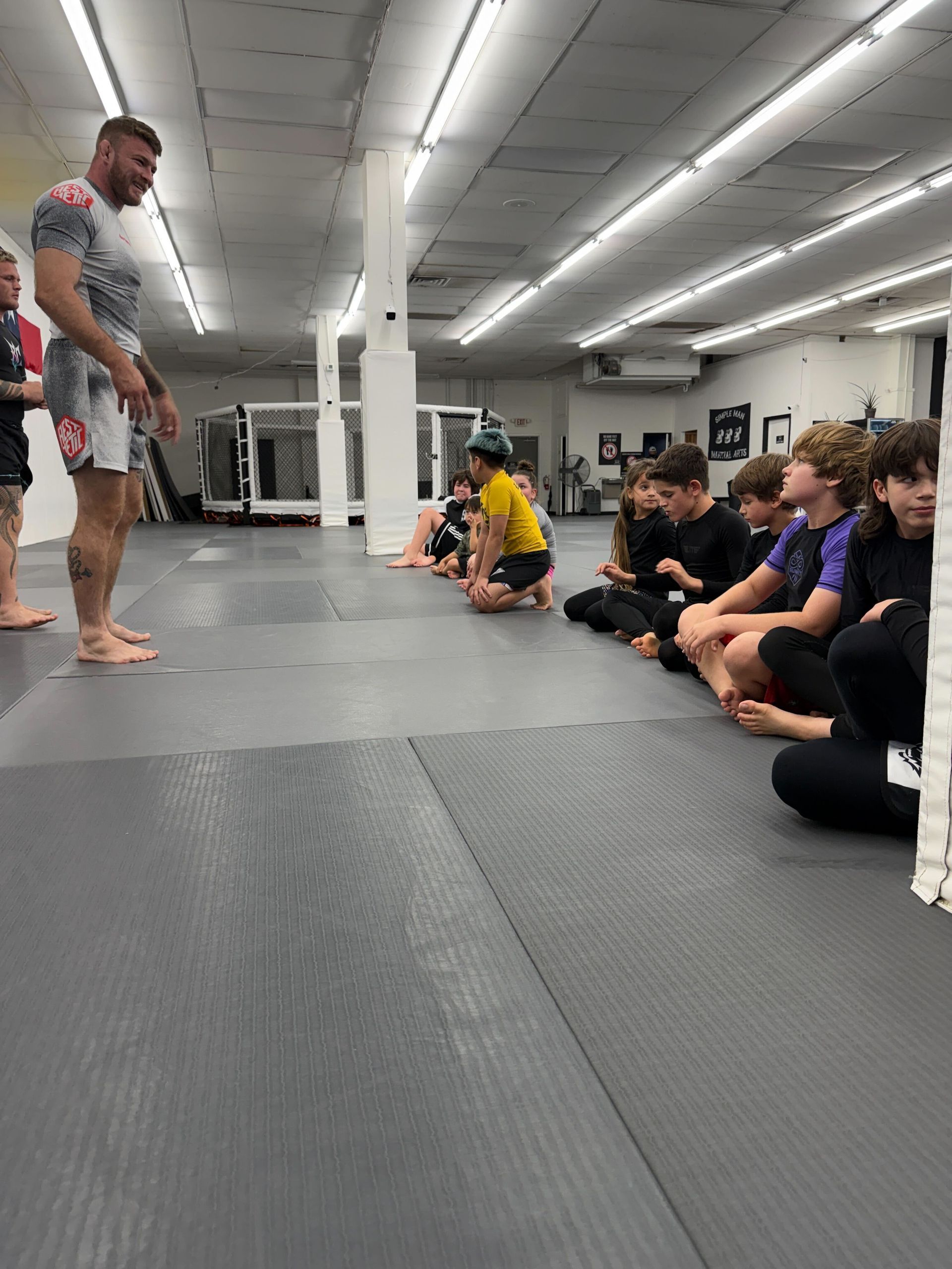 Students training together at Simple Man Martial Arts to improve fitness, confidence, and martial arts skills.