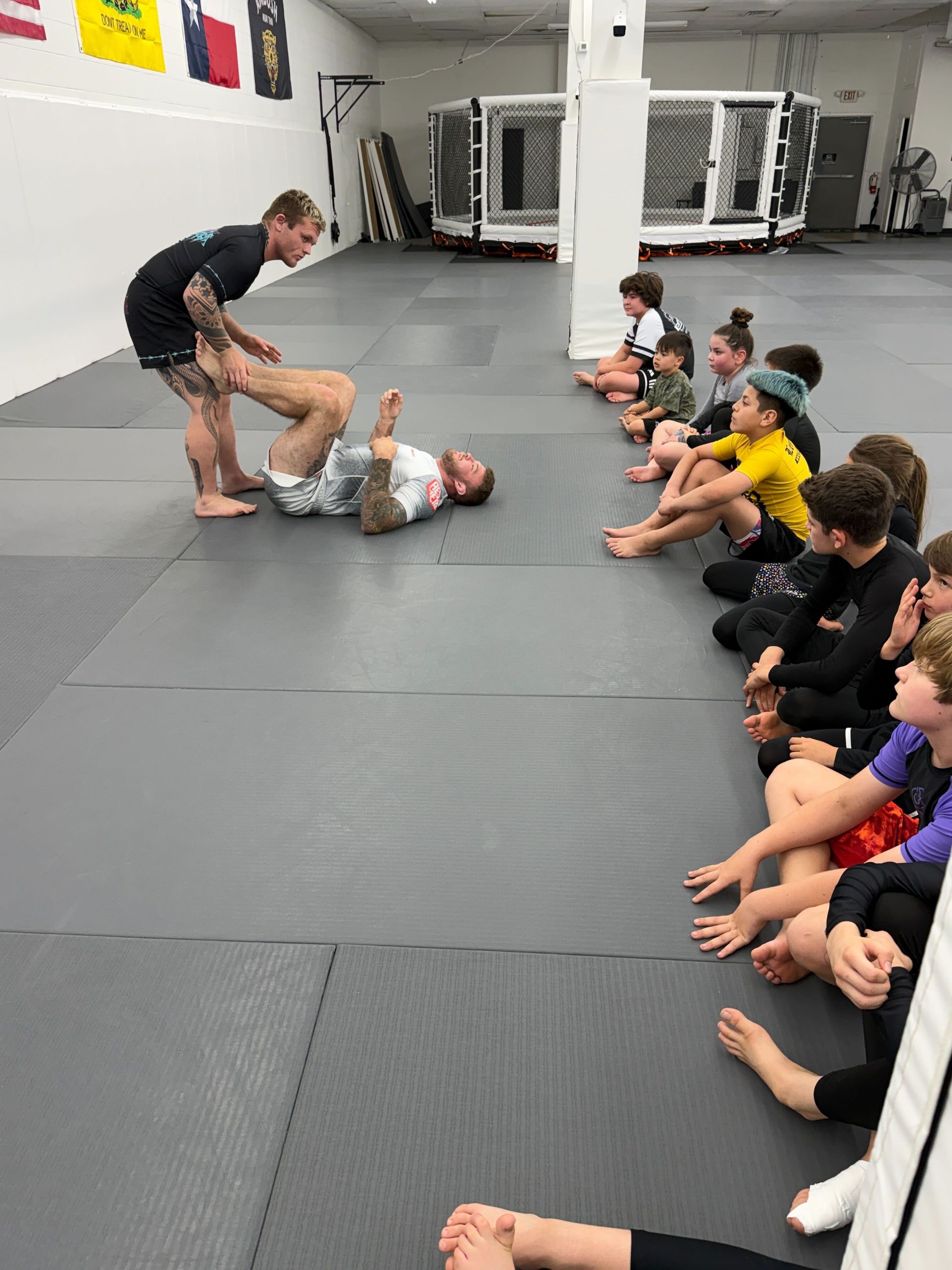 Children learning practical self-defense techniques during Kids Martial Arts class at Simple Man Martial Arts.