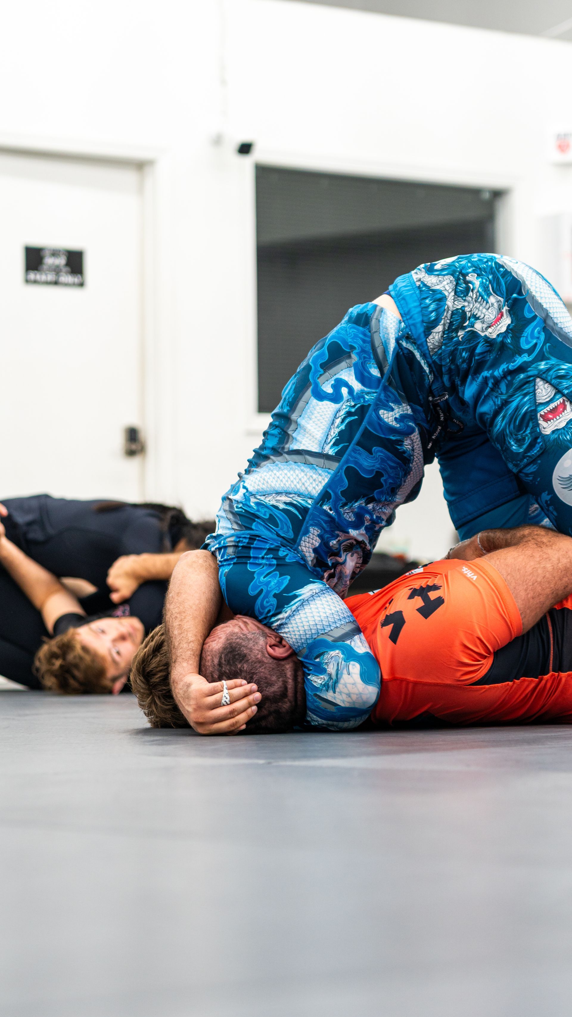 Adults practicing partner drills at Simple Man Martial Arts in Austin, Texas, building confidence and connection.
