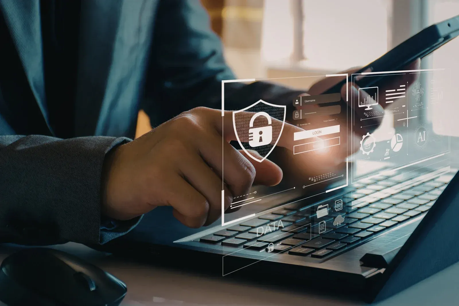 Hands typing on laptop with digital shield and lock icons, showing cybersecurity protection.