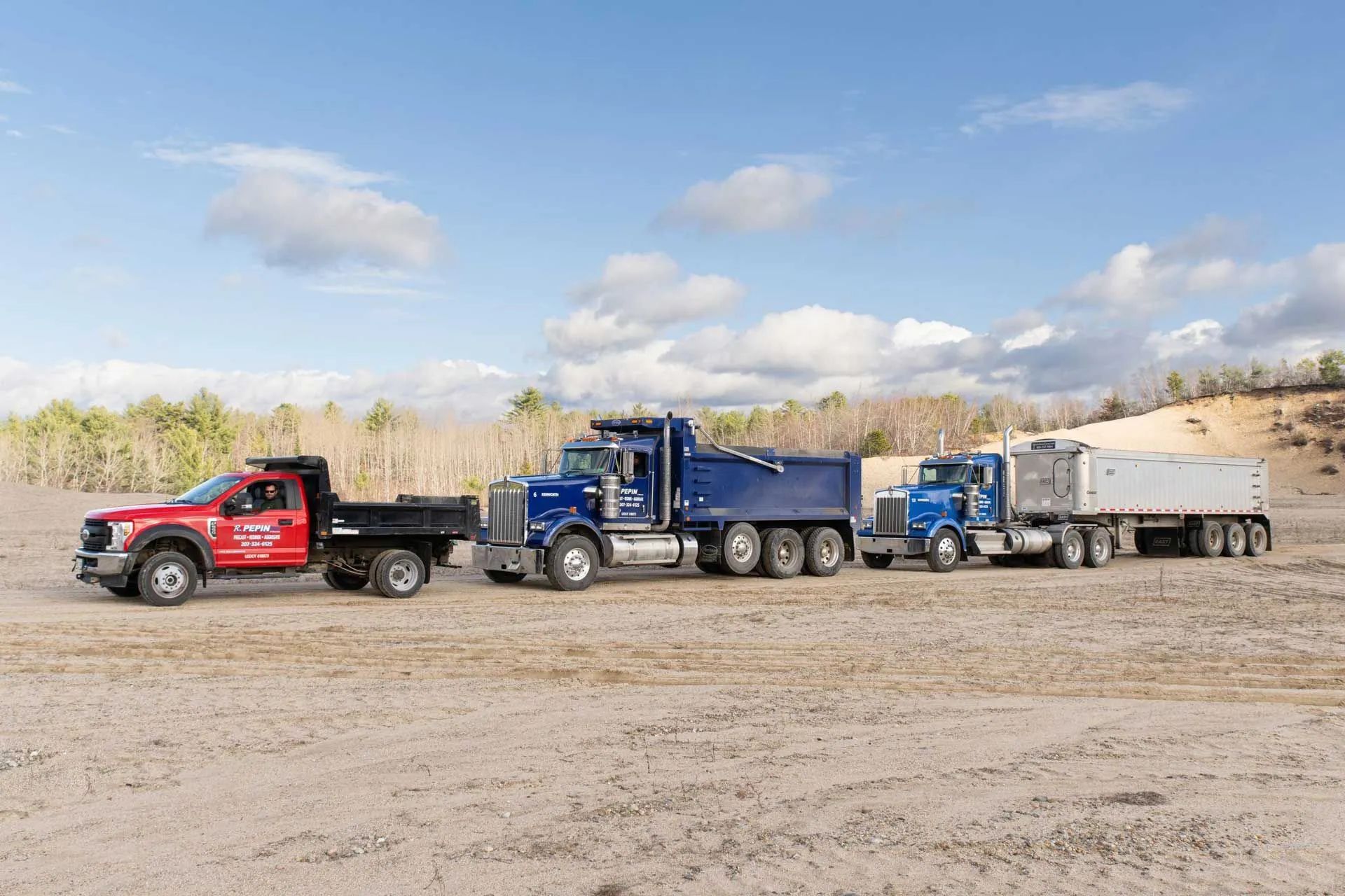 Three Dump Trucks — Sanford, ME — R. Pepin and Sons Inc. Three Dump Trucks — Sanford, ME — R. Pepin and Sons Inc.