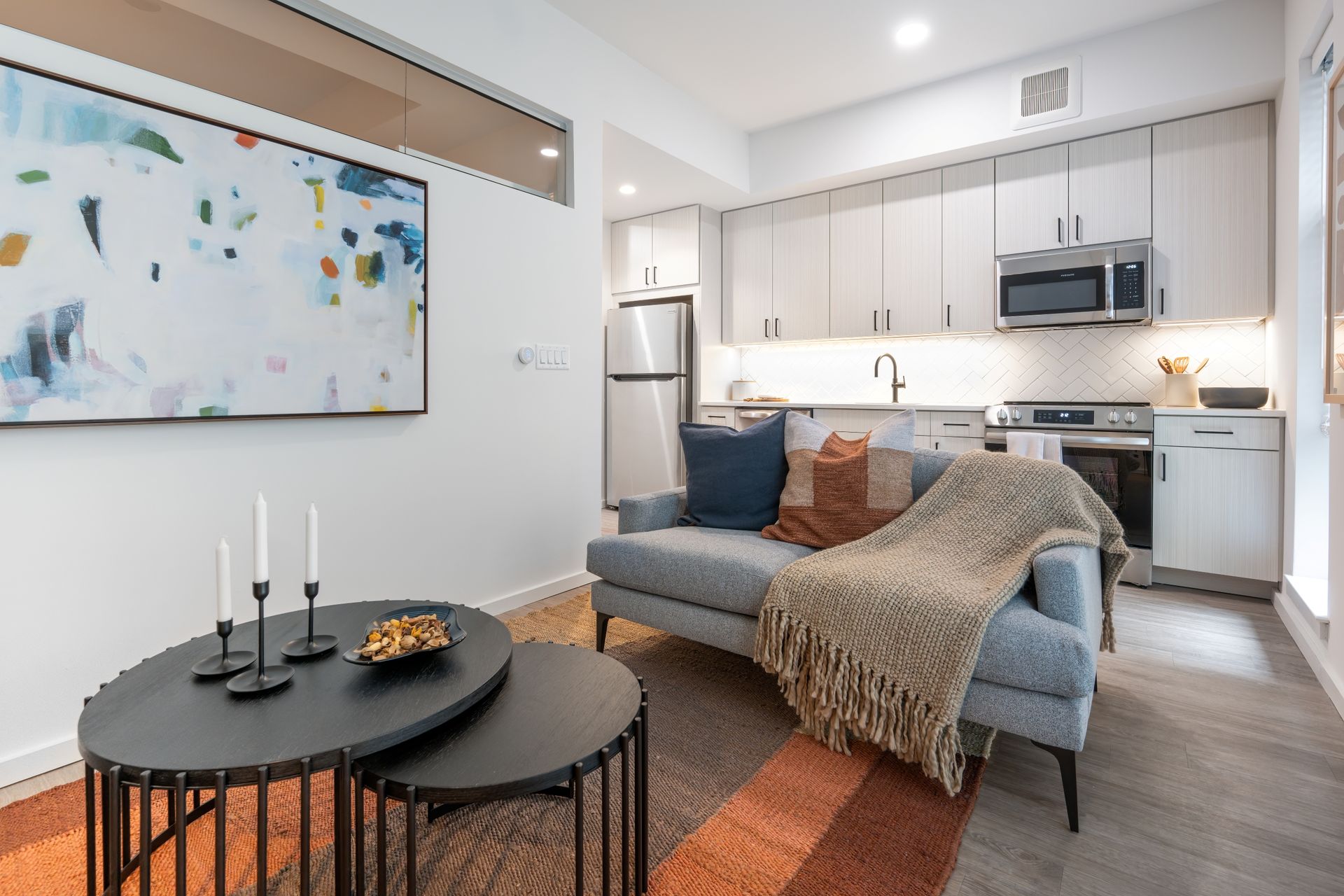 An artist 's impression of a bedroom with a large bed and a balcony.