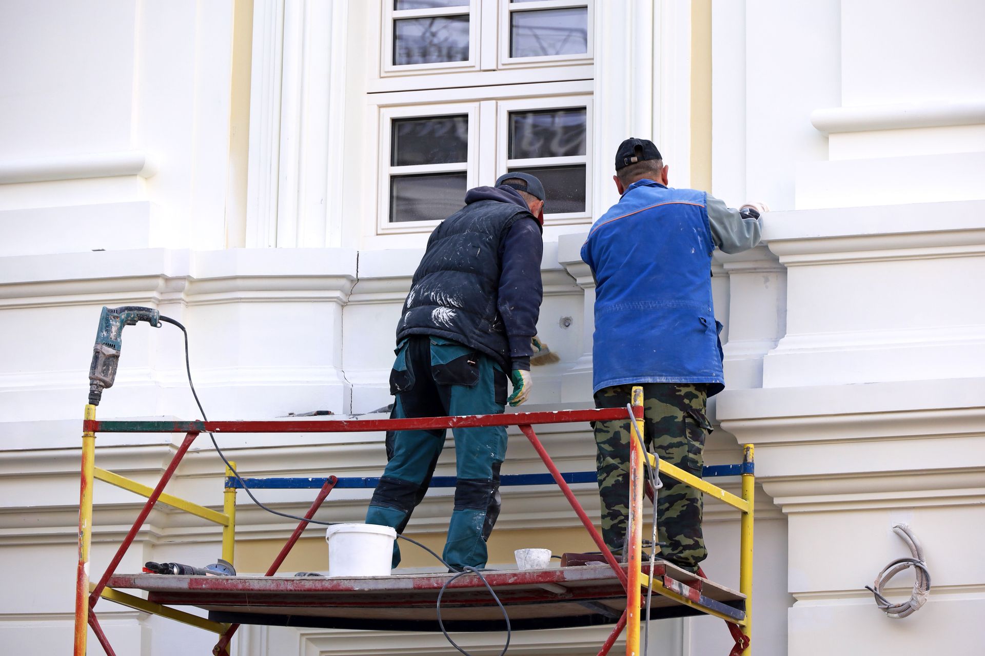 Exterior commercial painting gold accents
