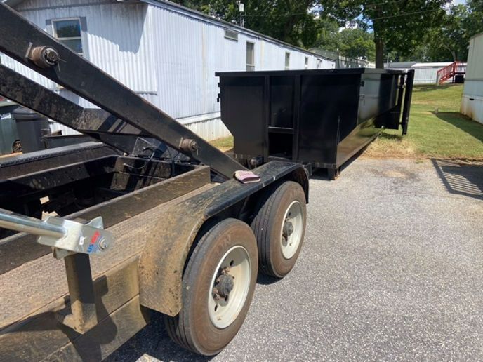 Dumpster rental dropped off in driveway
