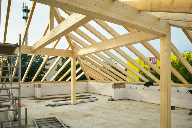 Bakersfield ADU Experts, CA wood roof framing for a custom ADU under professional construction.