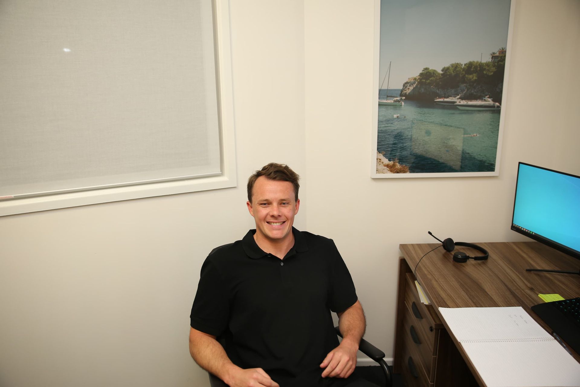 Tristan Evert sitting at a desk