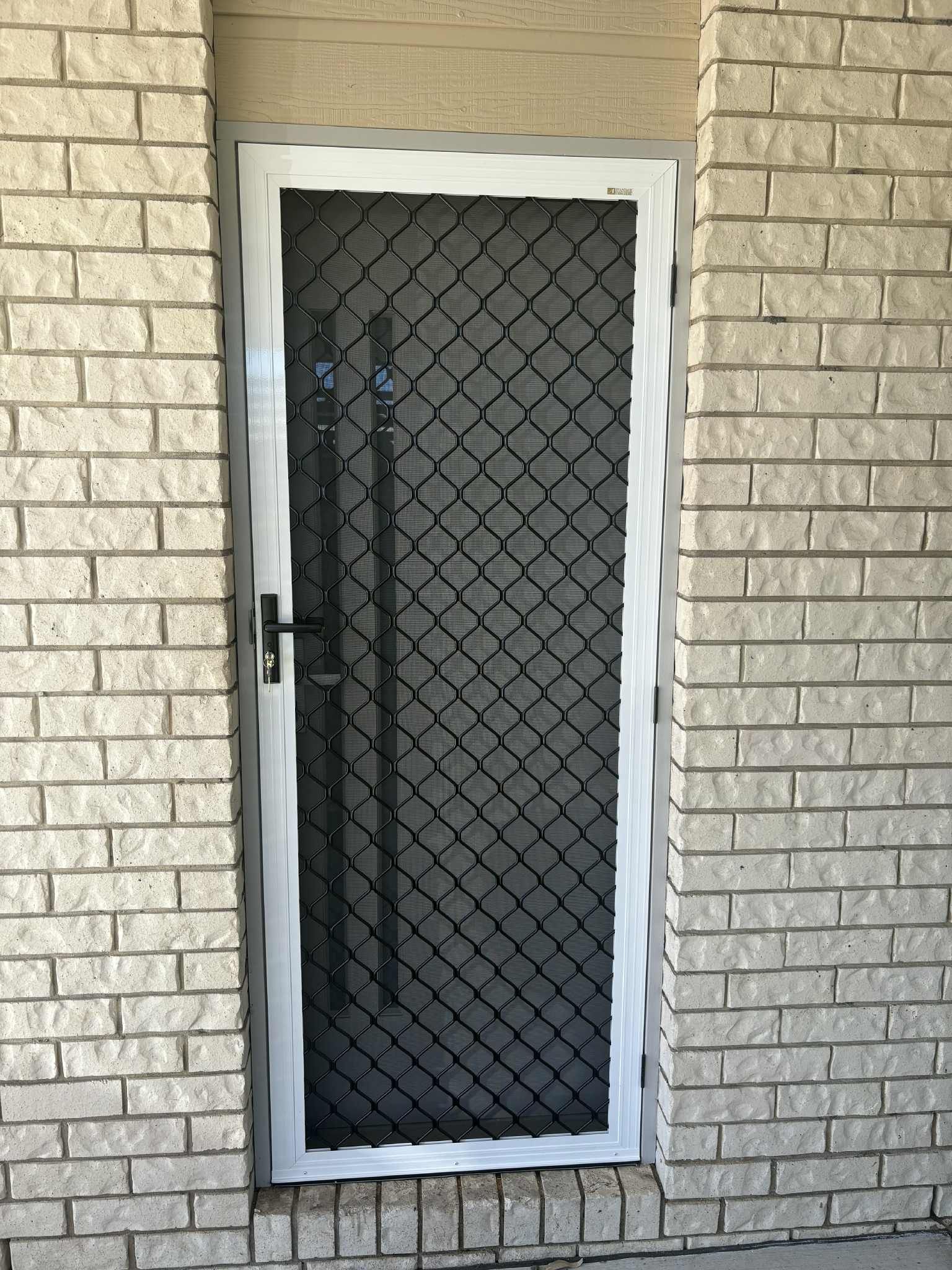 Security Door with Black Diamond Mesh — Advantage Screens and Blinds Hervey Bay In Pialba, Queensland
