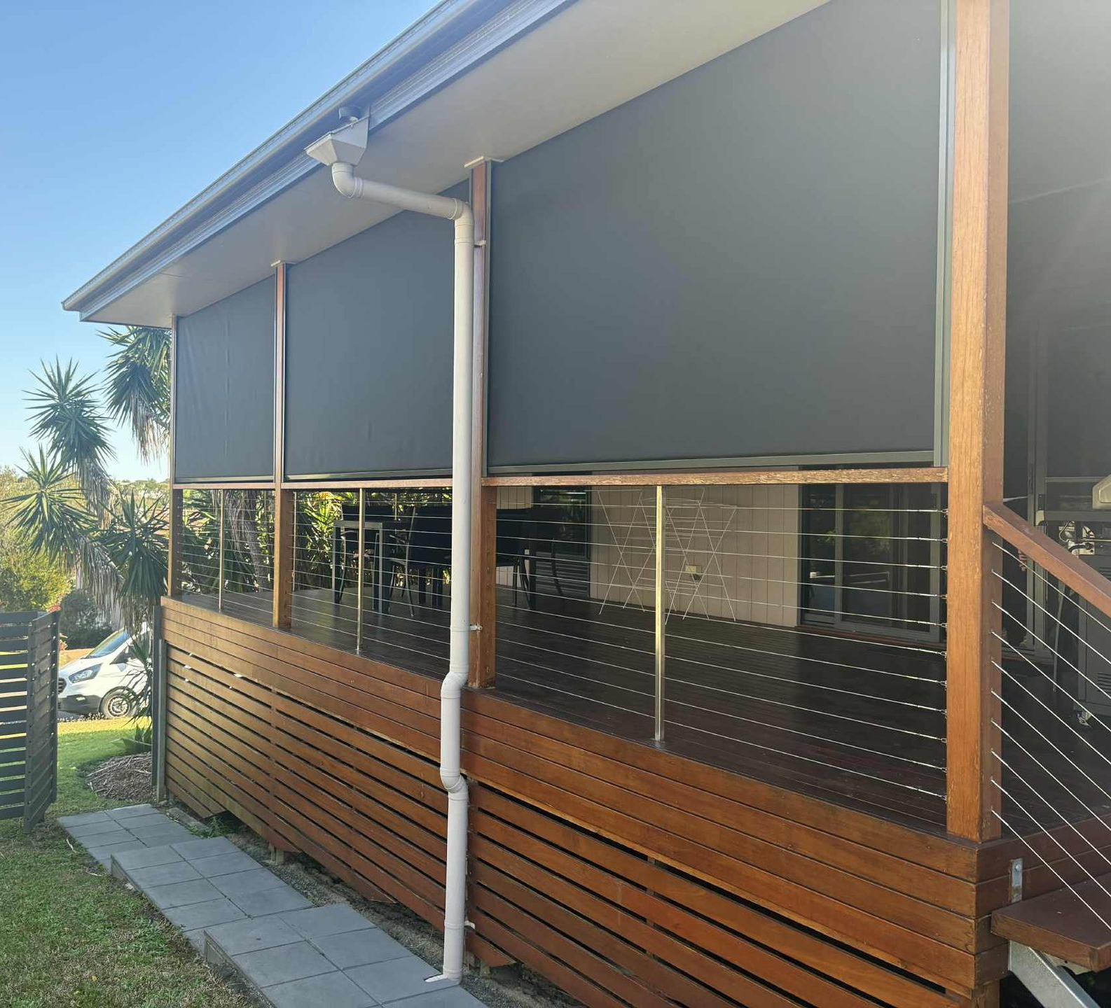 House Exterior with Gray Roller Blinds — Advantage Screens and Blinds Hervey Bay In Pialba, Queensland