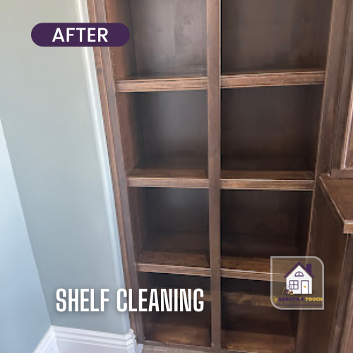 Clean wooden shelves in a built-in cabinet.