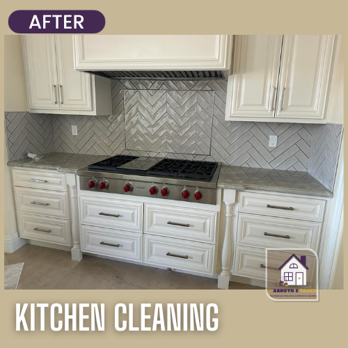 Clean, white kitchen with oven, cabinets, and herringbone backsplash;