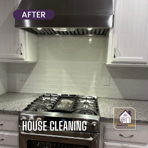 Clean kitchen backsplash and range hood, after house cleaning service.