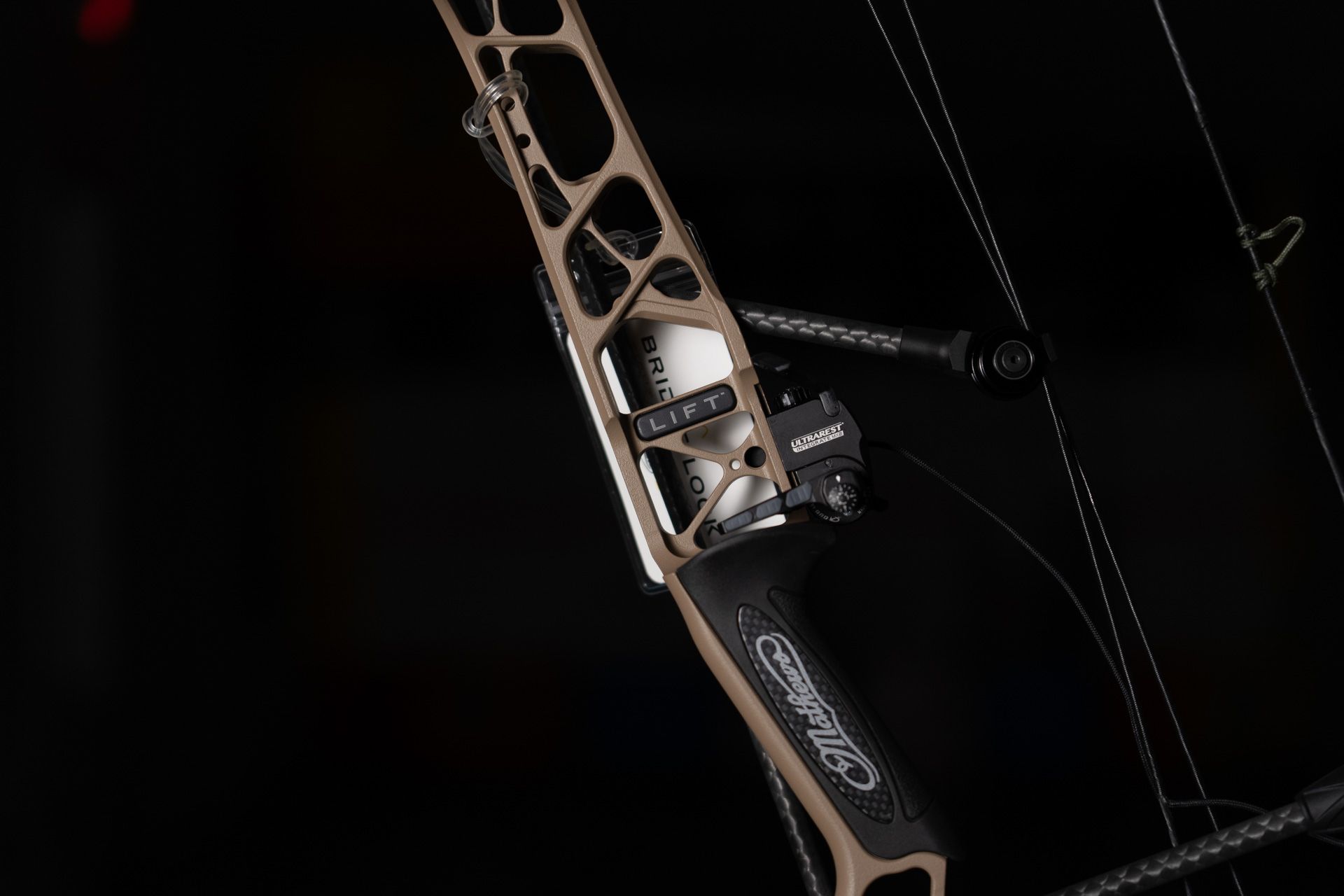 A close up of a bow on a black background.