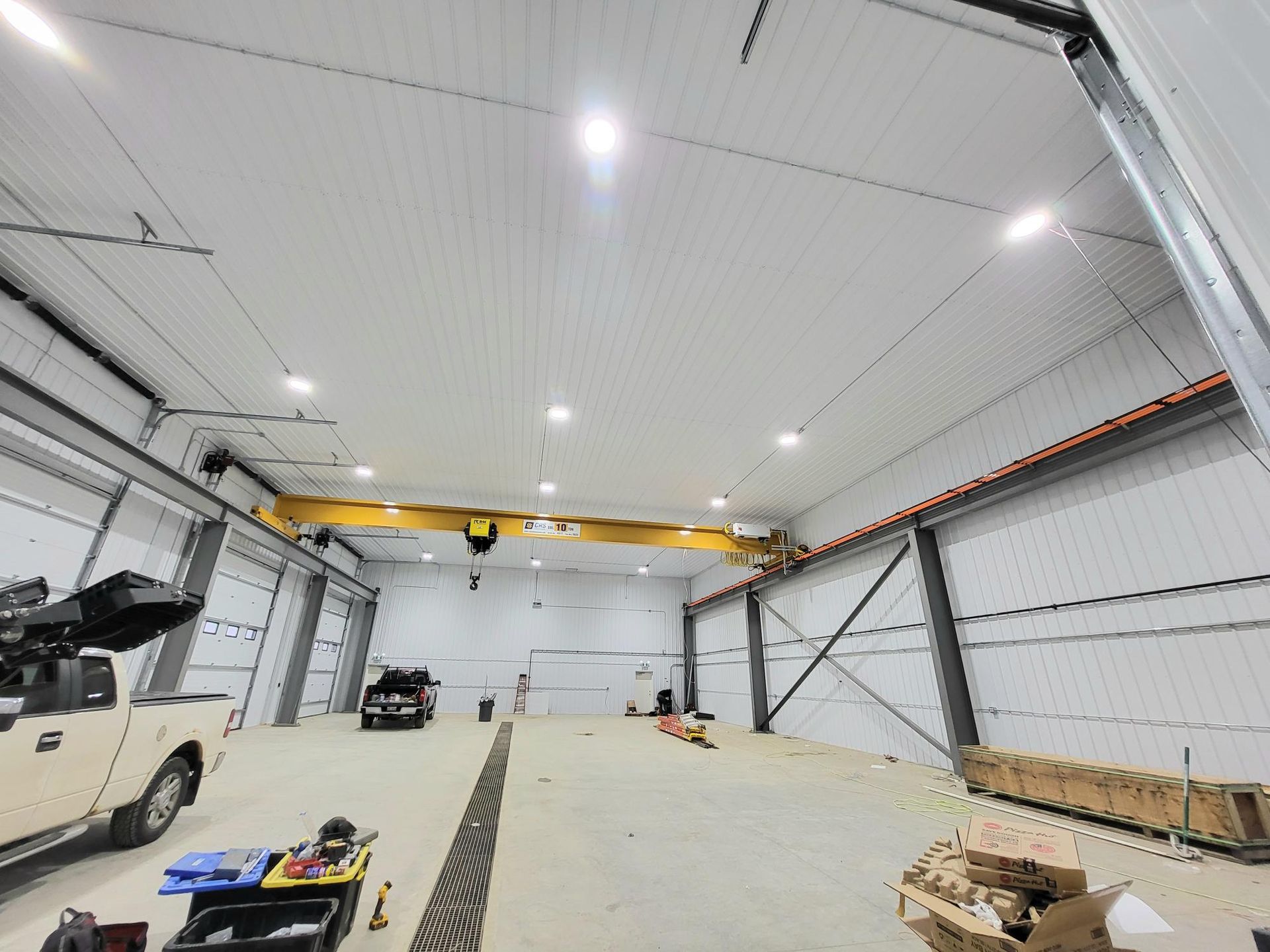 High bay warehouse lighting installation by Edmonton commercial electrician
