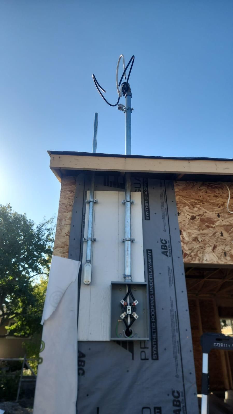 Overhead service mast installation for 200 amp upgrade in Edmonton