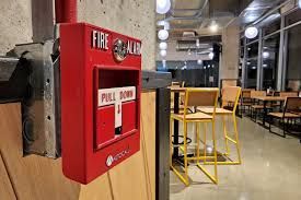 Emergency exit lighting installation in Edmonton commercial building