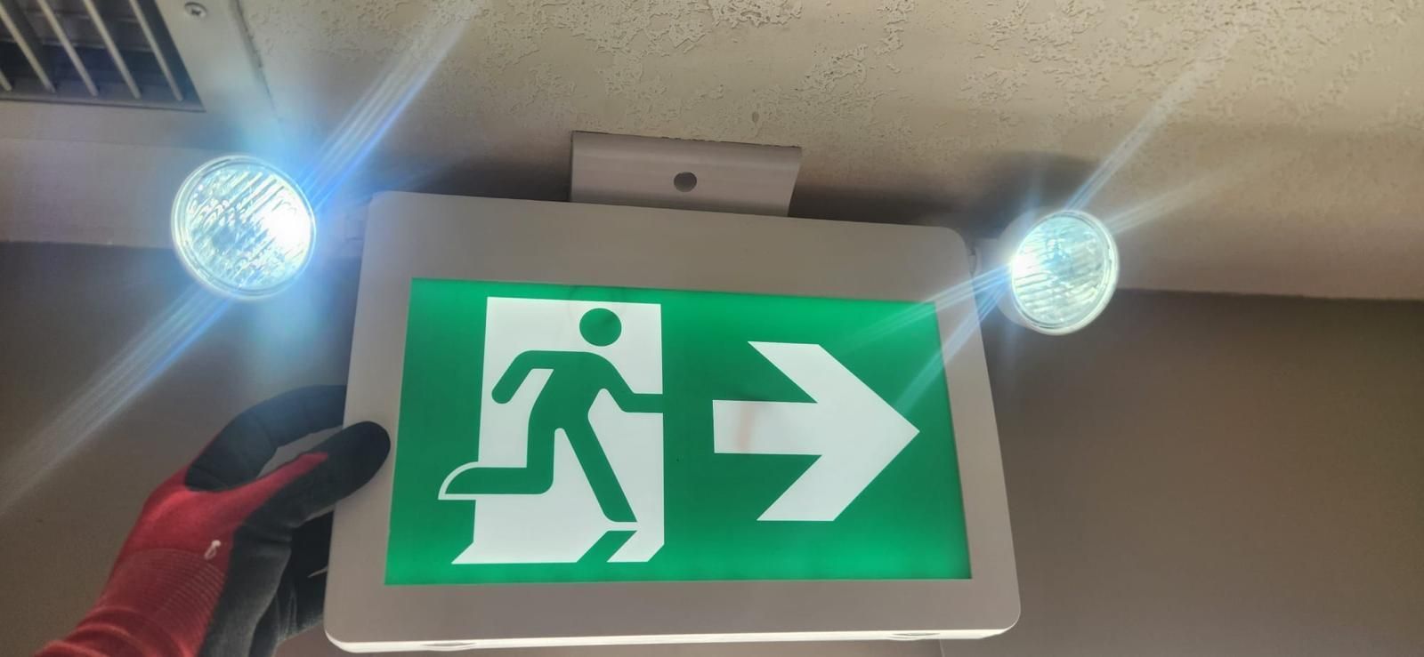 Running man exit sign and emergency lighting in Edmonton