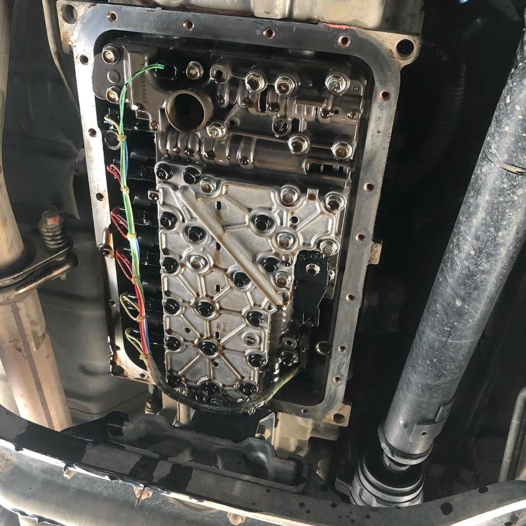 A Close Up Of A Car Engine With The Oil Pan Removed — SG Mobile Mechanic In Newcastle, NSW