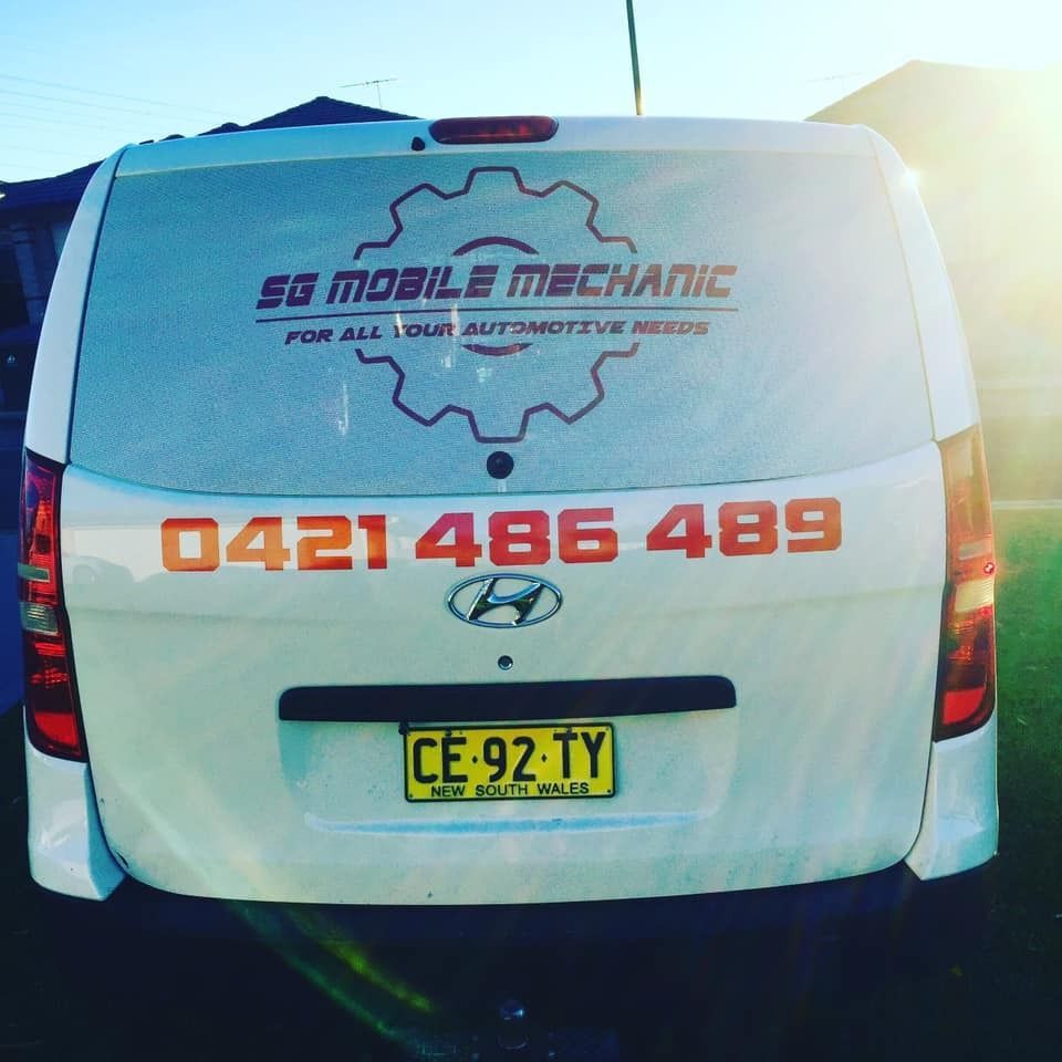 The Back Of A White Van Says Sg Mobile Mechanic For All Your Automotive Needs — SG Mobile Mechanic In Newcastle, NSW