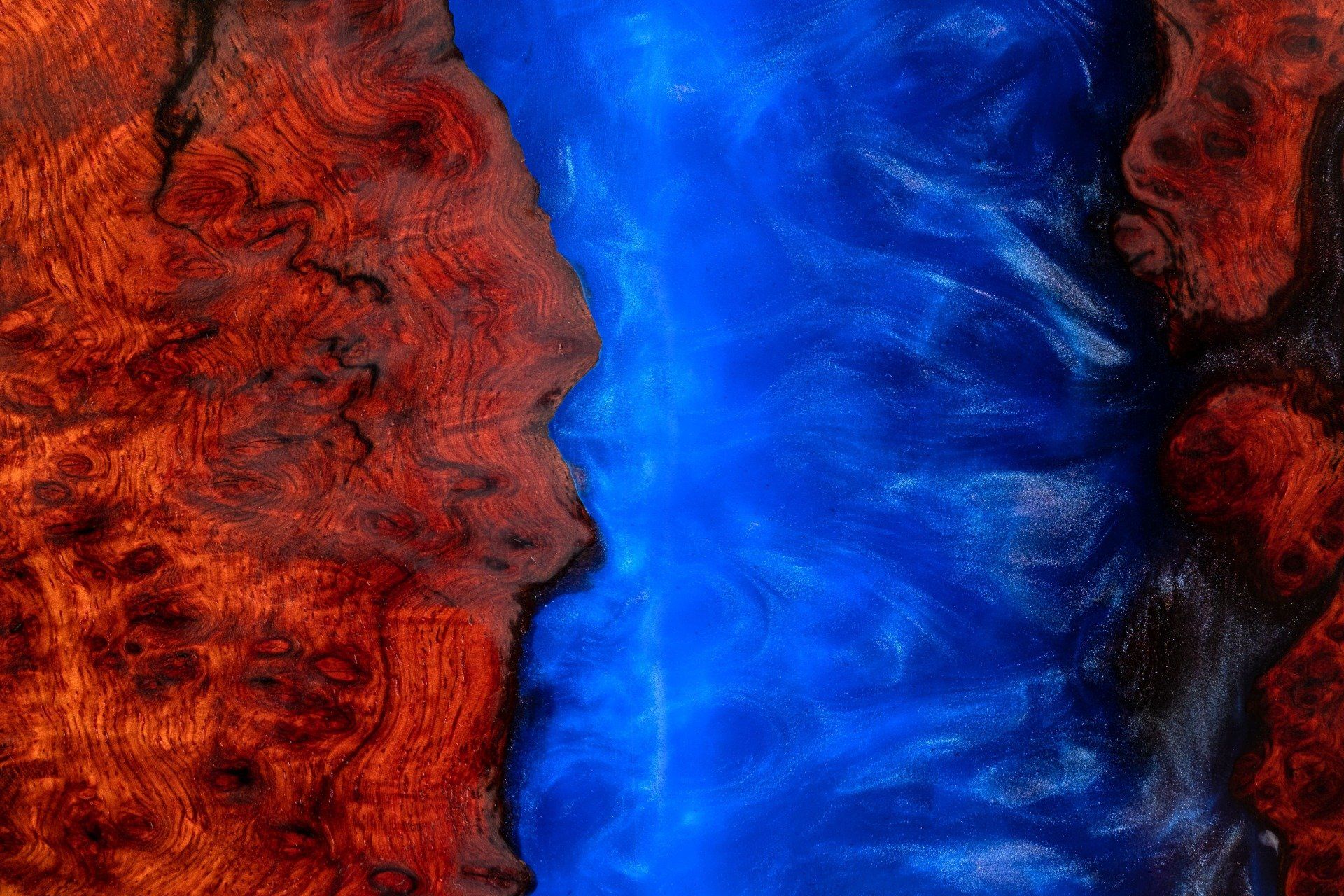 Colored blue epoxy swirl on concrete wall in Rancho Cucamonga