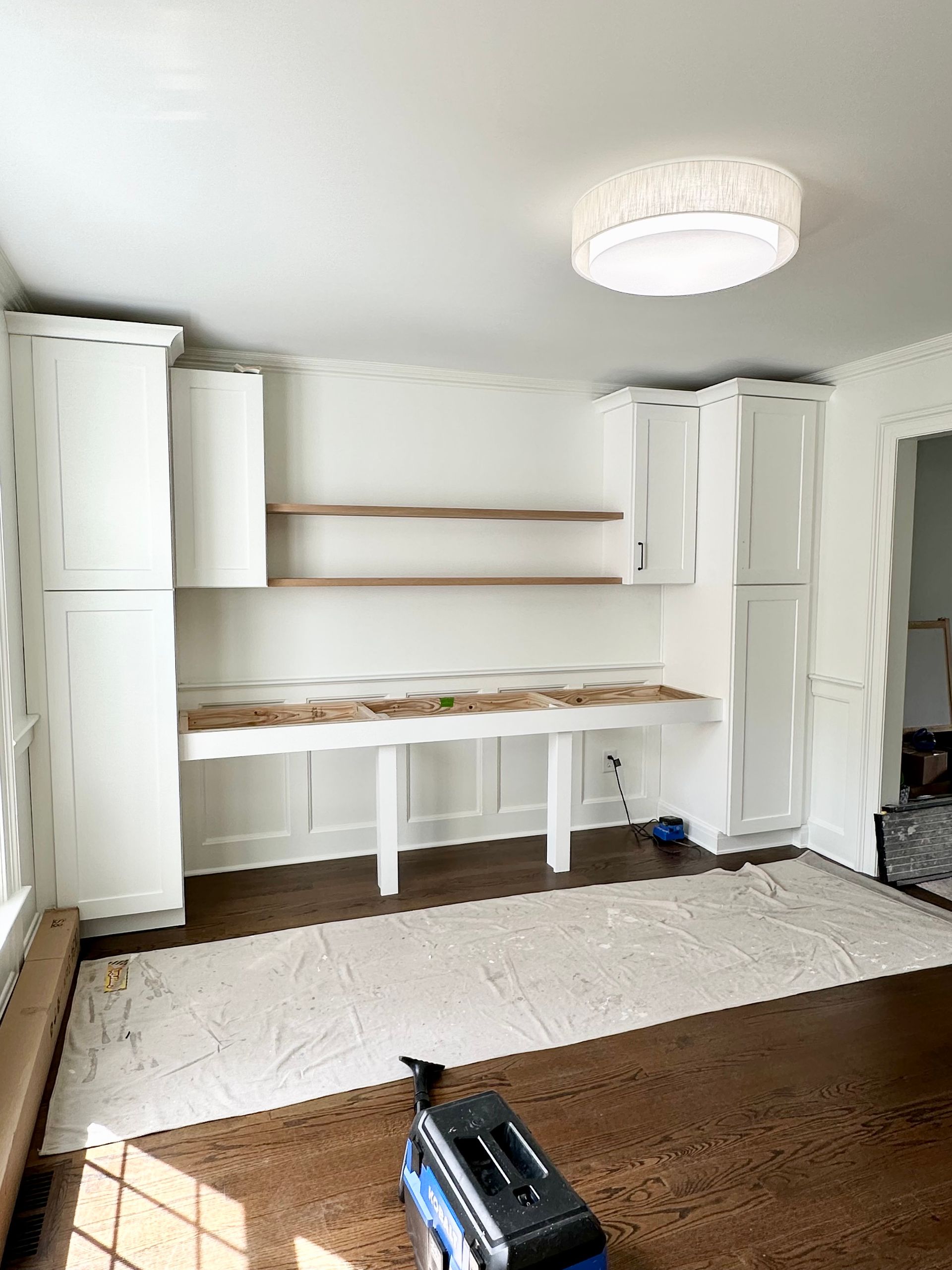 Built in cabinet and storage design by Christy Martin