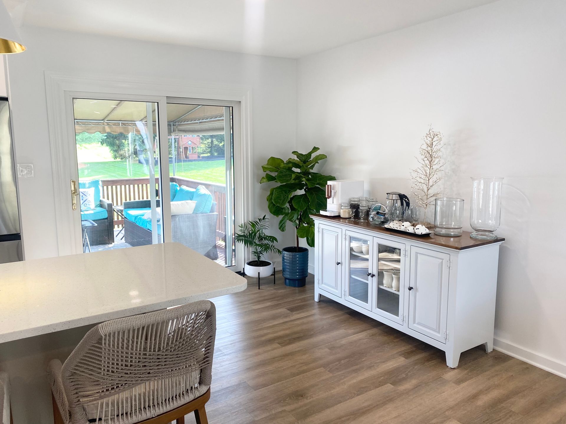 beautiful living room with a sliding glass door and a white dresser in Lancaster PA