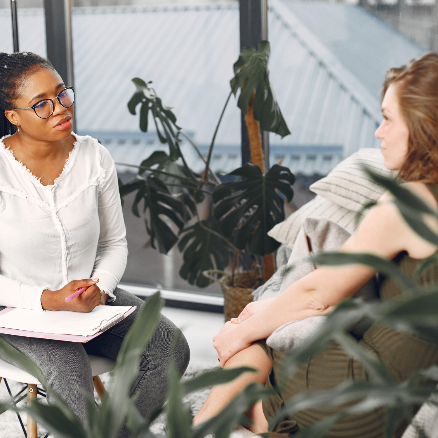 female counsellor talking to a patient