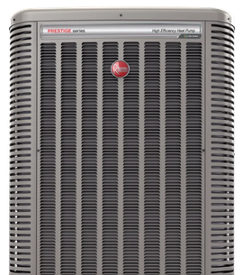 Front view of a gray vintage Trane air conditioner with a grille and red logo