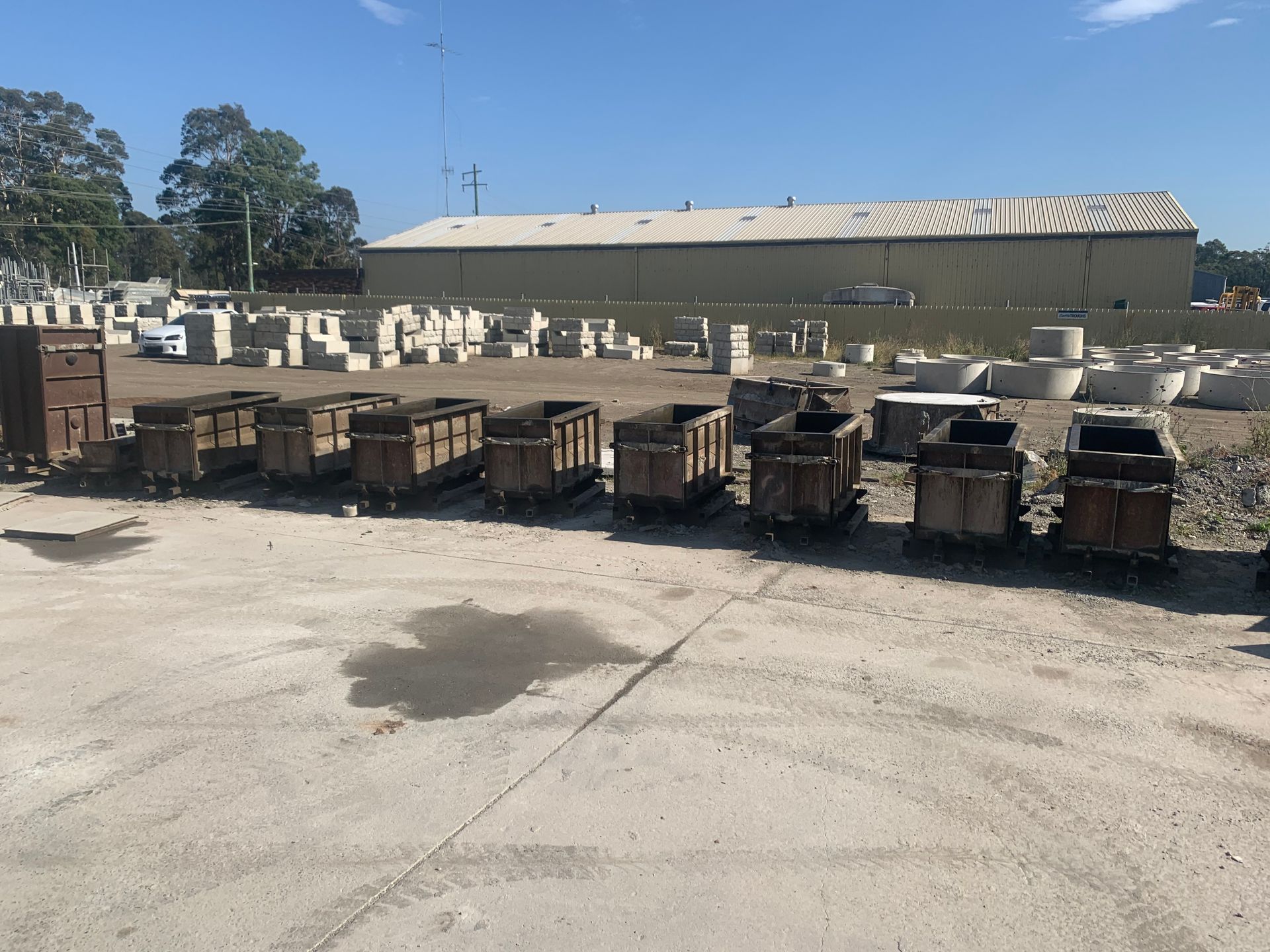 Steel Truck Containers Lined Up At Concrete Yard — Bennett's Environmental In Kangaroo Valley, NSW