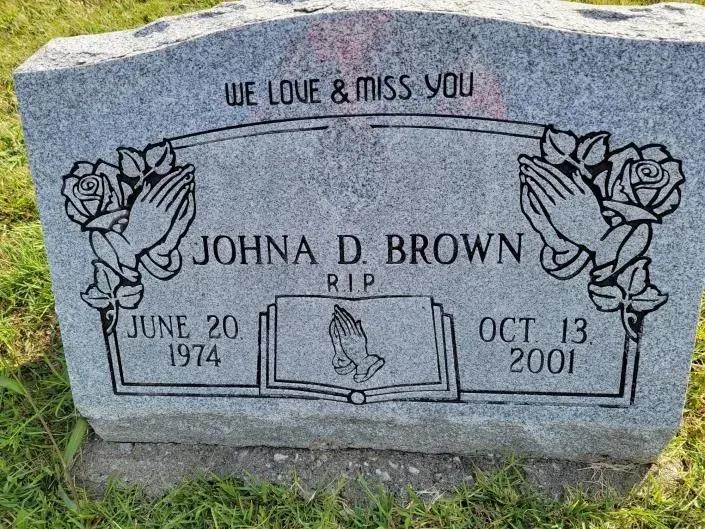 A gravestone for johna d brown , who died on october 13 2001.