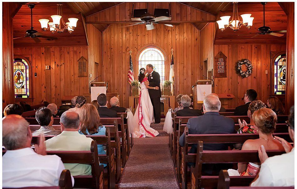 A bride and groom are getting married in a church